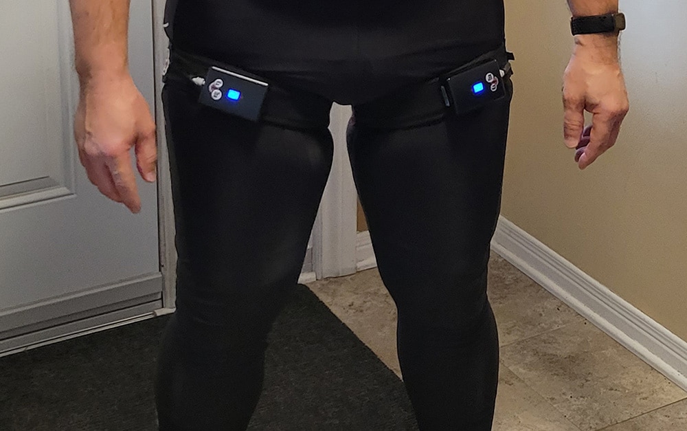 Cycling wearing KAATSU B1 Air Bands for recovery